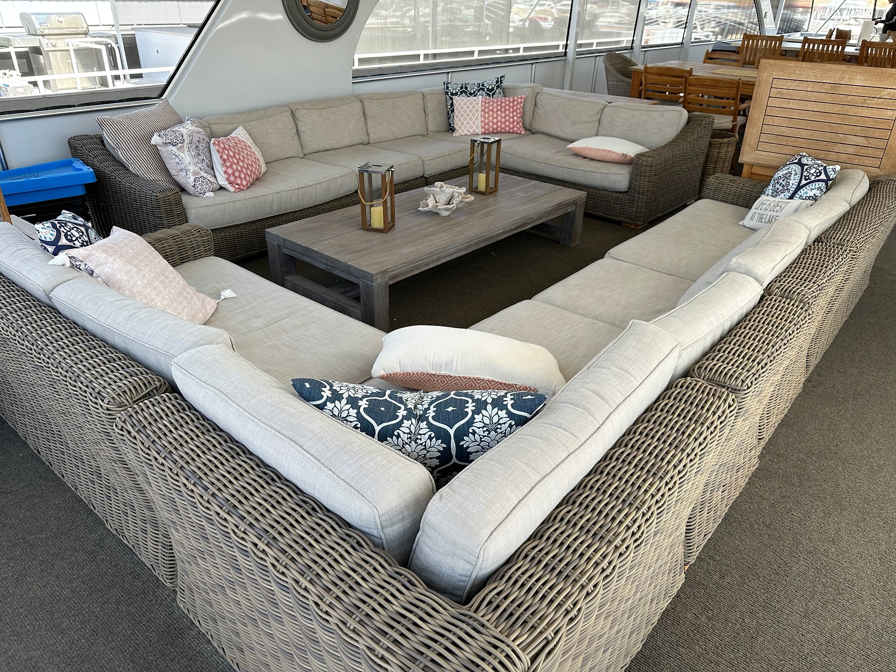 Houseboat lounge with light upholstered seating around a coffee table